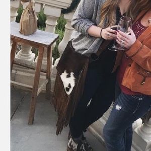 Cowhide fringe leather purse